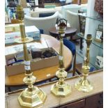 Three similar modern lacquered brass table lamps of candlestick design 17'',