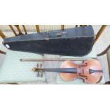 An early 20thC copy of a Stradivarius violin the back 14''L with bow cased CA
