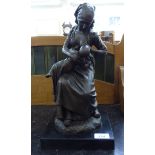 A Tate Gallery edition of a cast of a bronze group, a seated young Dutch mother, feeding her baby,