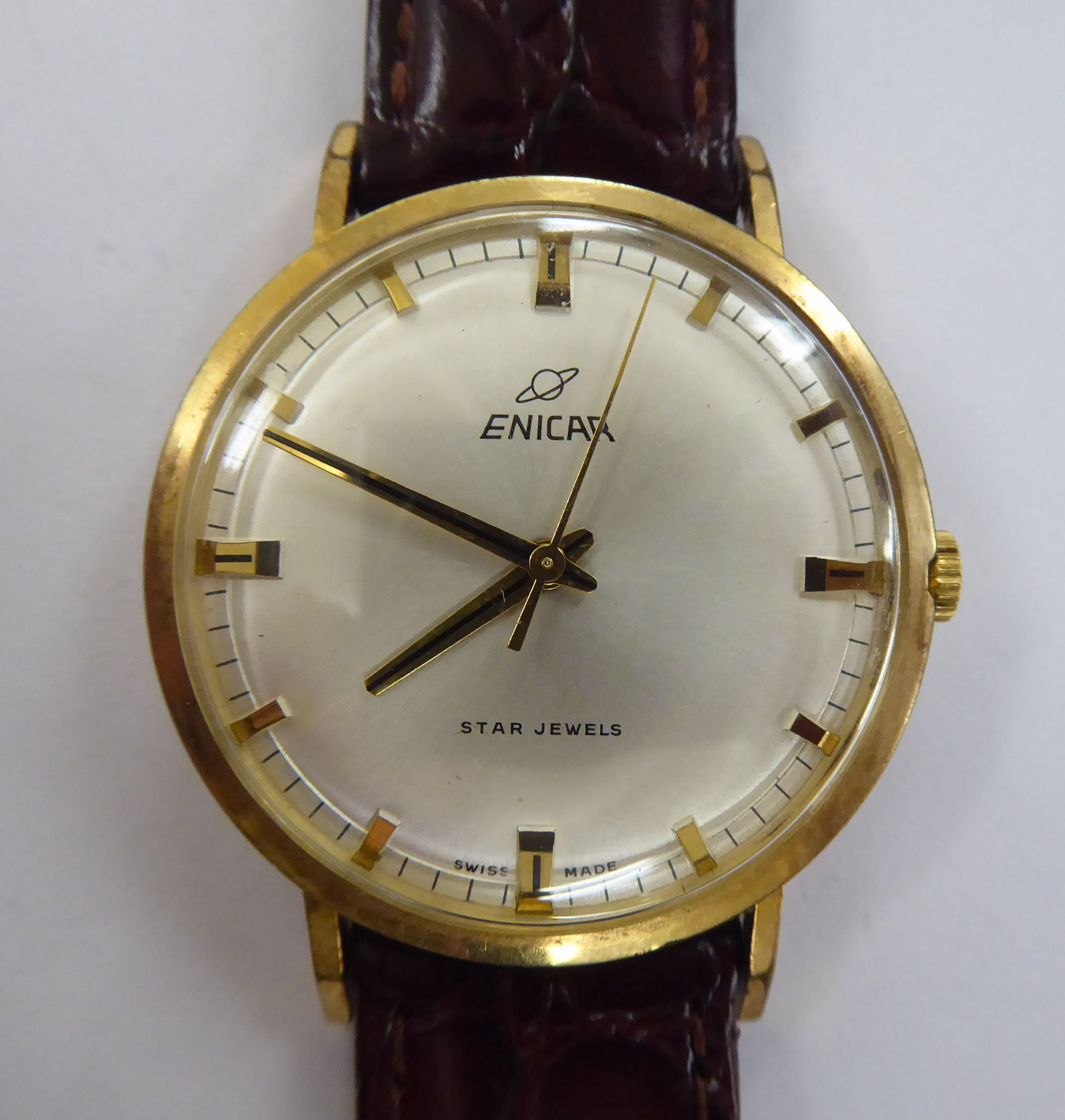 A 1960s Enicar gold plated stainless steel cased wristwatch, the movement with sweeping seconds,