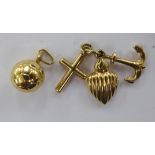 A 9ct gold football charm; and another, comprising a conjoined anchor,