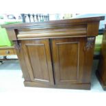A late Victorian mahogany chiffonier with a frieze drawer, over a pair of panelled doors,