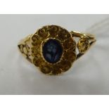 An early Victorian yellow metal forget-me-not floral design ring 11