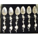 A set of six late Victorian ornately cast silver teaspoons Sheffield 1895 boxed OS10