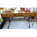 An early 20thC string inlaid mahogany sofa table with two frieze drawers and two facsimiles on the
