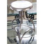 A modern steel dressing stool,