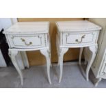 A pair of modern French inspired cream coloured painted and gilded single drawer bedside chest,