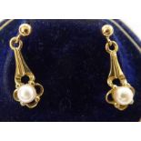 A pair of yellow metal pearl set pendant earrings 11