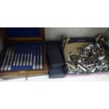 Two cased sets of six silver plated fish knives and forks;