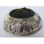 An Edwardian silver mounted pin cushion Birmingham 1909 3''dia 11