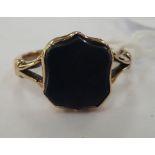 An Edwardian yellow metal bloodstone set signet ring 11