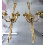 A pair of modern 'antique' design, cast gilt metal,