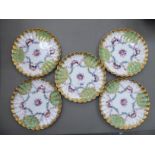 A set of five Copeland china plates with wavy, lobed borders,