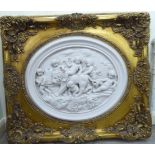 A modern composition marble effect plaque, depicting six cherubic figures and a lion,