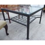 A modern cast metal lamp table,