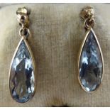 A pair of 9ct gold aquamarine set pendant earrings 11