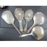 Five silver backed dressing table handmirrors mixed marks S