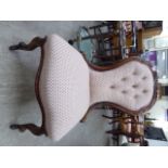 A modern Victorian style mahogany framed salon chair,