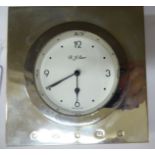 A modern silver mounted mantel timepiece stamped 925 4''sq OS10