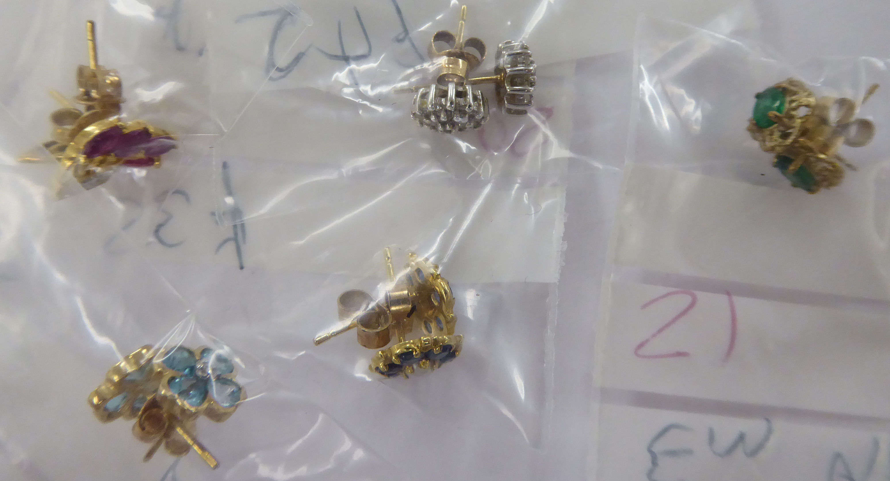 Five pairs of yellow metal variously set earrings 11