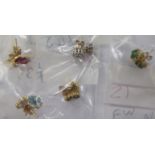 Five pairs of yellow metal variously set earrings 11