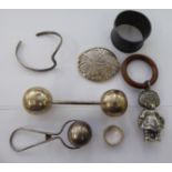 White metal objects: to include a baby's teething ring and two spherical rattles 11