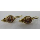 A pair of silver gilt earrings,