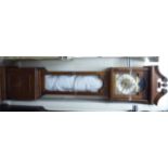 A modern oak cased granddaughter clock;