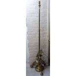 An 'antique' inspired cast and lacquered brass standard lamp,