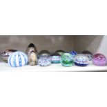 Glass paperweight: to include some decorated in floral designs with canes;