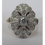 An 18ct gold pave set diamond ring 11