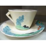 A Clarice Cliff cream glazed china tea cup and saucer,