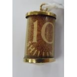A 9ct gold moulded cylindrical pendant,