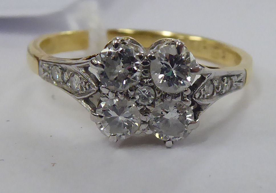 An 18ct gold five stone diamond ring,