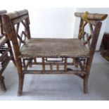 A late 19thC Colonial bamboo framed stool with raised sides and an upholstered seat BSR
