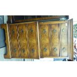 A modern yewwood and burr walnut finished tallboy with six graduated drawers,