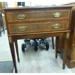 A modern Georgian design walnut canteen chest with two drawers containing Regency silver plate and