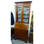 An Edwardian crossbanded and ebony inlaid mahogany bureau bookcase,