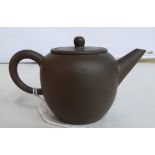 A Chinese brown earthenware miniature teapot with a loop handle, short,