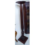 An early 20thC William IV style mahogany torchere,