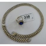 A silver coloured metal flexible, cast ball link necklace,
