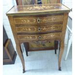 A late 19th/early 20thC French crossbanded satinwood and walnut serpentine front three drawer chest