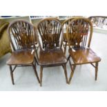 Six similar 20thC beech and oak framed hoop and wheelback dining chairs, each with a solid seat,