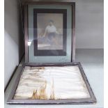 A glazed silver photograph frame with engine turned borders,