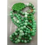 Jadeite items of personal ornament: to include graduated bead necklaces and earrings 11
