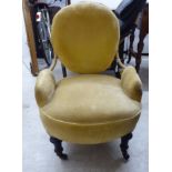 An Edwardian old gold coloured fabric upholstered tub chairs,