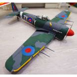 A scratch built motor powered model aircraft,