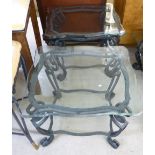 A pair of modern black painted wrought iron lamp tables,