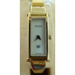 A lady's Gucci 1500L gold plated,