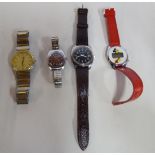 Four modern stainless steel cased wristwatches: to include a Tissot bracelet example,